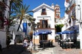 Old town buildings and restaurant, Marbella, Spain.