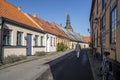 Old Town Cobblestreet with Housing at Ystad Midtown overlooking Church