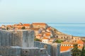 Old town of Dubrovnik with city walls and orange rooftops on Adriatic sea in Croatia. Famous european travel destination Royalty Free Stock Photo