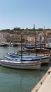 An old town in France on the Cote d`Azur, boats on the pier in France. Town of Casis summer 2022