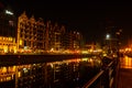 Old town in Gdansk at night. The riverside on Granary Island reflection in Moltawa River Cityscape at twilight. Ancient Royalty Free Stock Photo