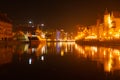 Old town in Gdansk at night. The riverside on Granary Island reflection in Moltawa River Cityscape at twilight. Ancient Royalty Free Stock Photo