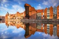 Old town of Gdansk reflected in the Motlawa river at sunrise, Poland Royalty Free Stock Photo