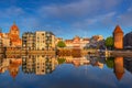 Old town of Gdansk reflected in the Motlawa river at sunrise, Poland. Royalty Free Stock Photo