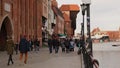 Old town in Gdansk. The riverside on Granary Island reflection in Moltawa River Cityscap. Ancient crane at dusk. Visit