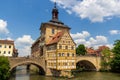 Old town hall with bell tower and bridges over river Regnitz in Bamberg, Upper Franconia, Bavaria, Germany