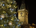 Old Town Hall Clock Tower and the Christmas Tree in Prague Royalty Free Stock Photo