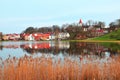 Old town houses with lake reflection Royalty Free Stock Photo