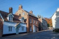 Old town houses in typical English village street. Wymondham UK. Royalty Free Stock Photo