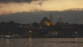 Old town Istanbul in prayer time. Looking over Golden Horn to Suleymaniye Mosque on a twilight sky. 4K UHD video, 3840