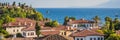 Old town Kaleici in Antalya. Panoramic view of Antalya Old Town port, Taurus mountains and Mediterrranean Sea, Turkey Royalty Free Stock Photo