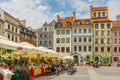 Old Town Market Square in Warsaw is a bustling local gathering place and a symbol of the city\'s resilience