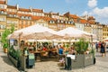 Old Town Market Square in Warsaw is a bustling local gathering place and a symbol of the city\'s resilience