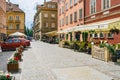 Old Town Market Square in Warsaw, Poland, is a bustling local gathering place and a symbol of the city\'s resilience