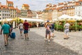 Old Town Market Square in Warsaw, Poland, is a bustling local gathering place and a symbol of the city\'s resilience