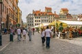 Old Town Market Square in Warsaw, Poland, is a bustling local gathering place and a symbol of the city\'s resilience