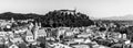 Old town and the medieval Ljubljana castle on top of a forest hill in Ljubljana, Slovenia in black and white Royalty Free Stock Photo