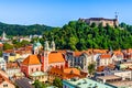 Old town and the medieval Ljubljana castle on top of a forest hill in Ljubljana, Slovenia Royalty Free Stock Photo