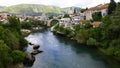 Old town of Mostar and Stari Most bridge above beautiful emerald river Neretva Royalty Free Stock Photo