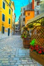 Old town with narrow street and street cafe, Rovinj, Croatia Royalty Free Stock Photo