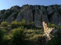 high cliff with abandoned structure