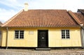 Old town of Odense, Denmark. Yellow house is the birthplace of Hans Christian Andersen. Royalty Free Stock Photo