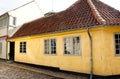 Old town of Odense, Denmark. Yellow house is the birthplace of Hans Christian Andersen. Royalty Free Stock Photo