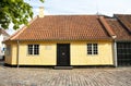 Old town of Odense, Denmark. Yellow house is the birthplace of Hans Christian Andersen. Royalty Free Stock Photo