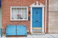 Old town Philadelphia, state of Pennsylvania, USA. Brick house and vintage blue doors