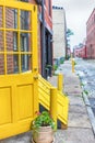Old town Philadelphia, state of Pennsylvania, USA. Brick house and vintage yellow doors