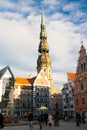 Old town square in the center of Riga, Latvia. Tourist attractions House of Blackheads and St Peters church