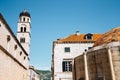 Old town Stradun street, Franciscan Church and Monastery and Large Onofrio`s Fountain in Dubrovnik, Croatia