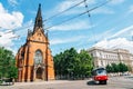 Old town street, The Church of Jan Amos Comenius Red Church and tram in Brno, Czech Republic