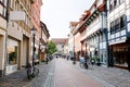 Old town street in Goettingen, Lower Saxony, Germany. Numerous shops. Royalty Free Stock Photo