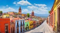 Old Town Street View with Brightly Colored Buildings in San Miguel de Allende, Mexico Royalty Free Stock Photo