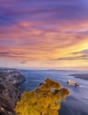 Old Town Thira on the Santorini island, famous churches against colorful sunset in Greece Royalty Free Stock Photo