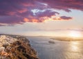 Old Town Thira on the Santorini island, famous churches against colorful sunset in Greece Royalty Free Stock Photo