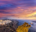 Old Town Thira on the Santorini island, famous churches against colorful sunset in Greece Royalty Free Stock Photo