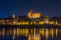 Old town of Torun with Church of St. John the Baptist and St. John the Evangelist. View on vistula river at night