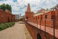 Old Town Warsaw. Towers and red brick walls of the historical Warsaw Barbican fort, Poland