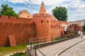 Old Town Warsaw. Towers and red brick walls of the historical Warsaw Barbican fort, Poland