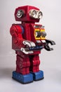 Old toy from the 1950s of a lonely and paradi robot made of red tin, battery operatedapan Royalty Free Stock Photo