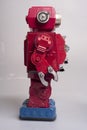 Old toy from the 1950s of a lonely and paradi robot made of red tin, battery operated