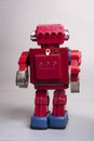Old toy from the 1950s of a lonely and paradi robot made of red tin, battery operated, Royalty Free Stock Photo