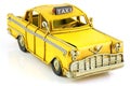 Old toy yellow taxi Royalty Free Stock Photo