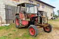 Old tractor and a barn