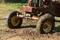 Old tractor being towed by a chain Royalty Free Stock Photo