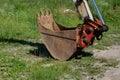 Old tractor bucket on the grass Royalty Free Stock Photo