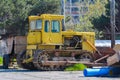 Old tractor bulldozer at plant Royalty Free Stock Photo