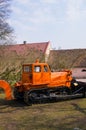 Old tractor for carrying out agricultural work in a field on a farm.7 April 2019.Latvia Royalty Free Stock Photo